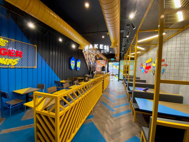 Amtico Signature vinyl planks laid in 4 colours and pattern to clients specification at Amigos Restaurant in Streatham.