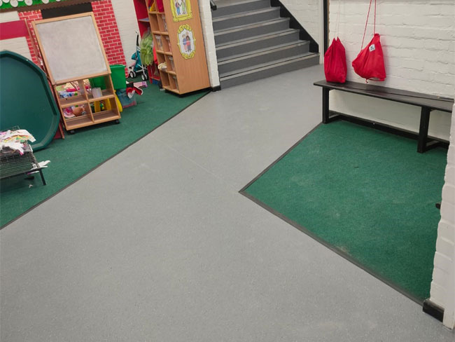 Altro Walkway 2mm slip resistant vinyl, Genesis Double section nosings to stairs and JHS Brossmatt 1 barrier matting to entrance fitted to the lobby area and stairs at Oaklands Primary School, Biggin Hill