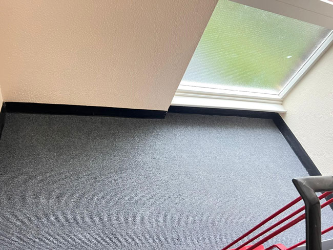 Heckmondwike Broadrib carpet, Heckmondwike Battleship barrier entrance matting and Genesis single section aluminium nosing to staircase installed at a residential block in Croydon for Concept Property Management Ltd.